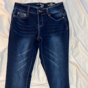 Dark wash mid rise fashion nova jeans